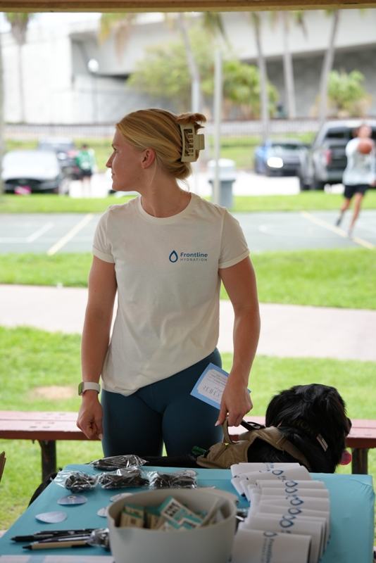 Team member at the Frontline Hydration event table